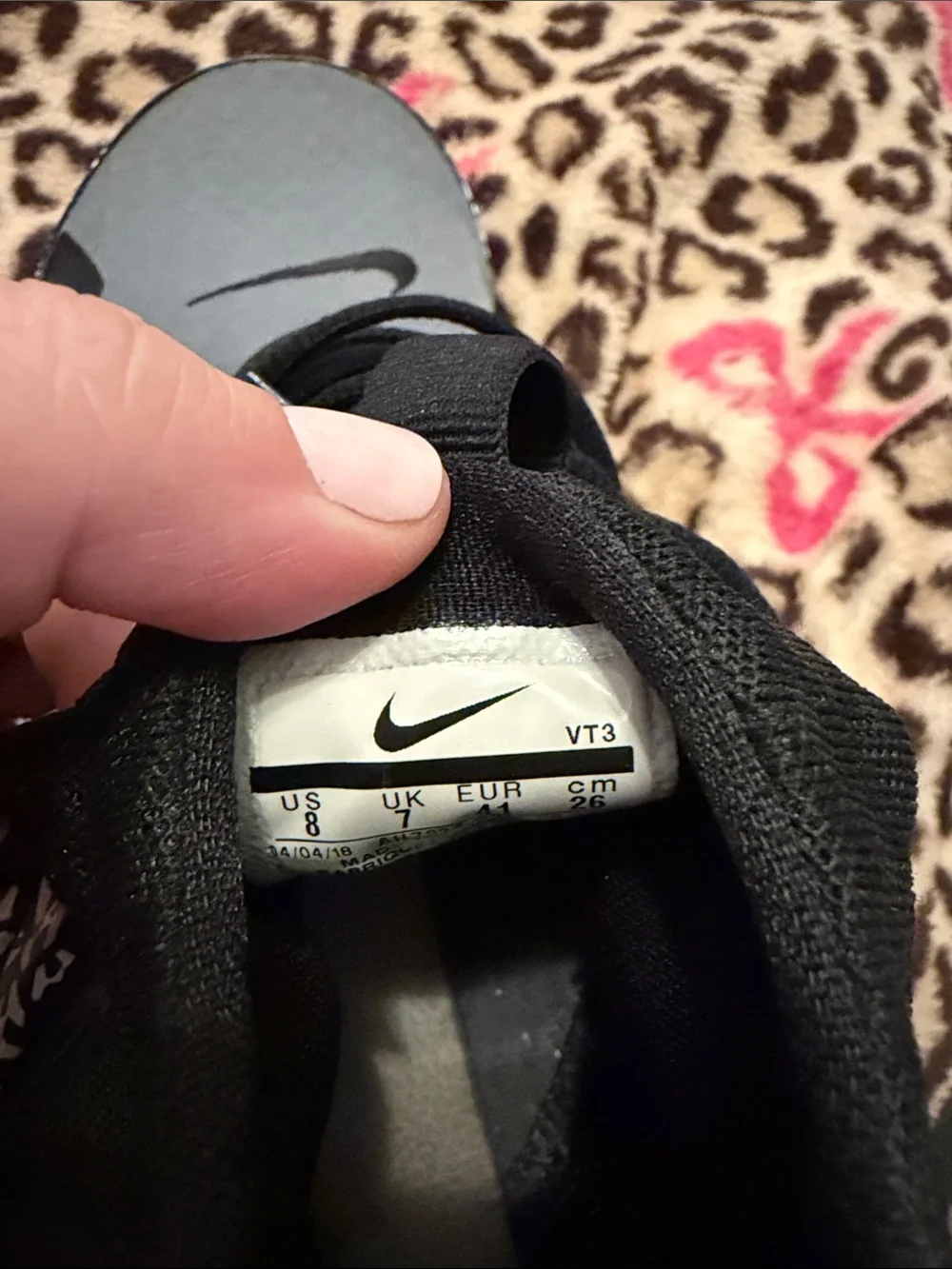 Nike Men’s Black and Gray High-Top Athletic Sneakers with Patterned Accents